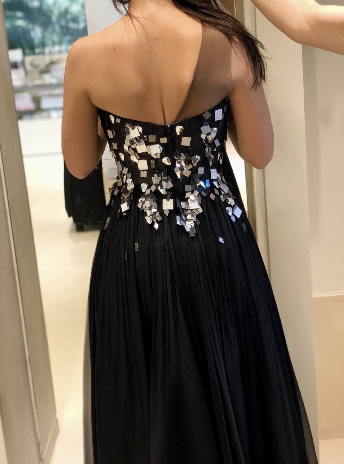 Black custom evening gown with hand-applied mirrored embellishments